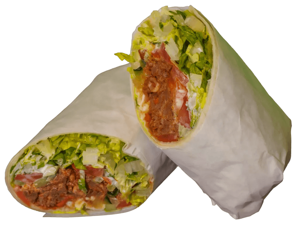 Two upright wraps showcasing fillings of seasoned white meat, red cabbage, creamy sauce, and fresh green herbs.
